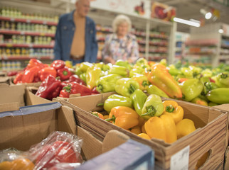 Sale of fresh vegetables in the grocery store. Pepper.
