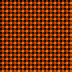 Orange and Black Houndstooth Tartan Seamless Vector Pattern Tile. Halloween Background. High Fashion Textile Print. Dog tooth Check Fabric Texture. Pattern Tile Swatch Included.