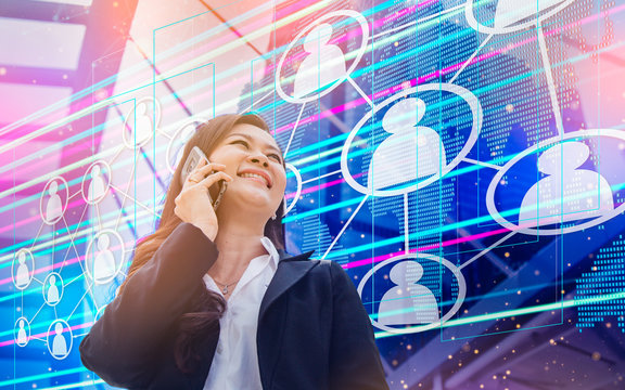 Communication technology mobile phone high tech concept. businesswoman using smartphone social media application icons flying background. 5g concept.