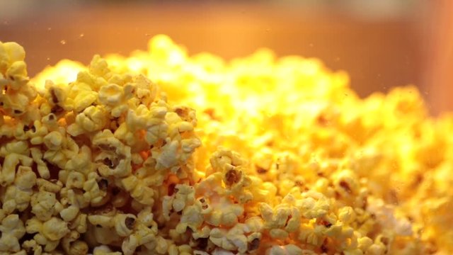 Rack focus movie theater popcorn close up