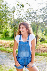 Fototapeta premium laughing young woman in the park