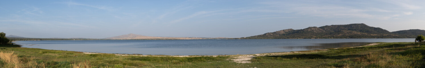 A panorama of a Spanish reservoir in Madrid. Taken in the evening