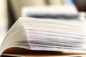 Open book on wooden deck