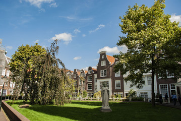 Naklejka premium Historic Begijnhof in the city of Amsterdam, Netherlands