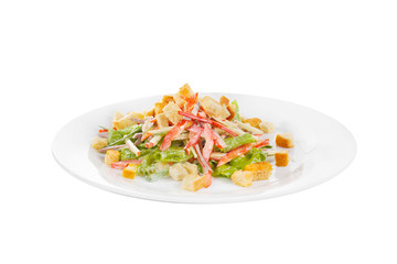 Caesar salad with meat, beef, chicken, pepper, rusks, lettuce, apple on plate, white isolated background Side view. For the menu, restaurant bar cafe