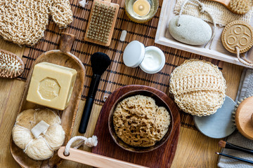 zero waste loofah, natural sponge, face cream and makeup brushes