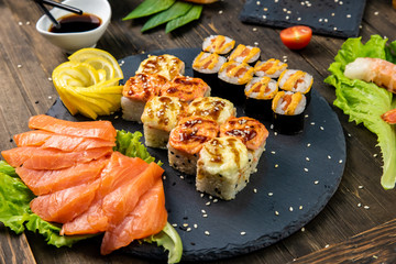 Wonderful sushi set, oriental theme on the old wooden table