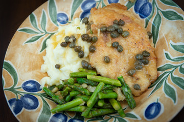 Chicken piccata with mashed potatoes and asparagus