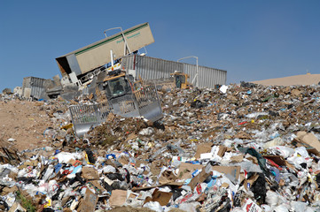 Equipment Working to Control Landfill Waste