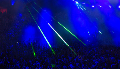 Concert crowd and lights grained background
