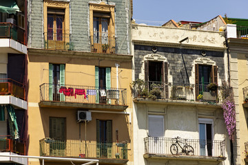 colorful balconies apartment building barcelona spain