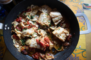 Baccalà funghi e pomodorini