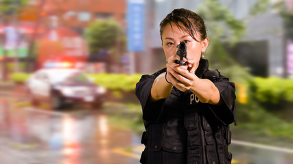 Asian American Woman Police Officer Pointing pistol