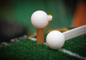 Close up of golf swing training aids for indoor practice, Low key