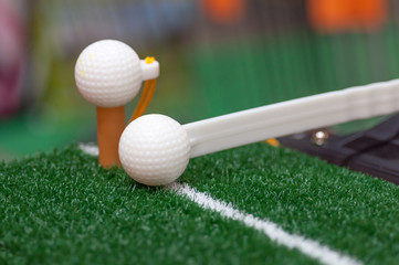 Close up of golf swing training aids for indoor practice, Low key