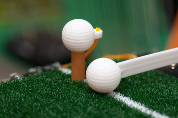 Close up of golf swing training aids for indoor practice, Low key