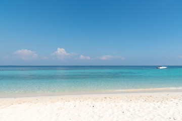Beautiful white sand on Tropical beach blue water and blue sky