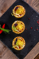 Canape with mushroom and cheese