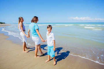 Happy family having fun in the summer leisure