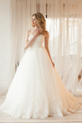 Fototapeta premium beautiful bride in a chic wedding dress