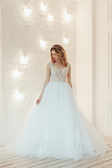 Obraz premium beautiful bride in a chic wedding dress