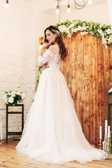 Fototapeta premium beautiful bride in a chic wedding dress
