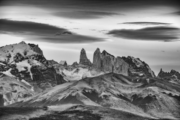 Torres del Paine, Patagonia, Chile with lenticular clouds above. Monochrome image