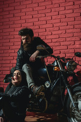 Fototapeta na wymiar road trip. road trip with sexy couple in love. road trip on motorbike. biker couple has road trip. traveling.