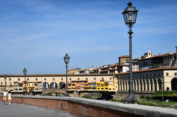 Fototapeta na wymiar Street lamps near the famous Old Bridge (Ponte Vecchio), Florence. Italy