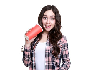 Young beautiful woman with paper cup on white background