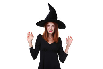 Beautiful redhaired woman in halloween costume isolated on white background