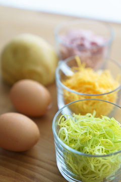Gluten free leek quich ingrediens on a wooden board
