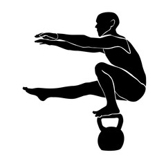 The athlete keeps balance in a squat on one leg on a weight.