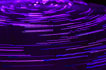 colored vortex effect created with fiber optic light source