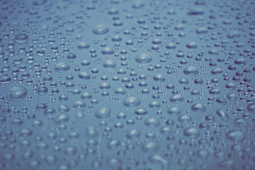 water drops on grey blue steel background texture
