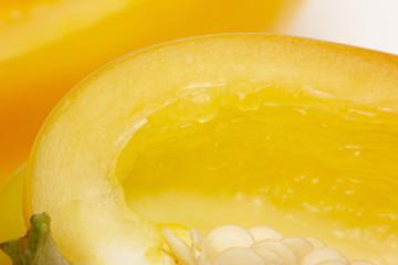 macro photography of seeds of yellow paprika. selective focus, blurred image. cut Bulgarian pepper, Colors of autumn.