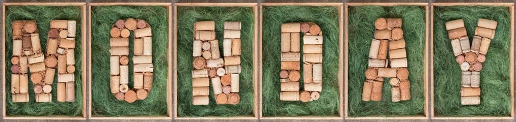 Word Monday made of wine corks on green background in wooden box