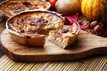 Homemade Cheesy Egg Quiche for Brunch with Spinach and Tomato, onions and zucchini.