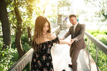 Young couple posing at the camera.