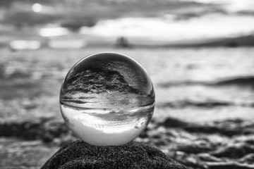 Seascape with Boats on Horizon and Surf Black and White in Glass Ball