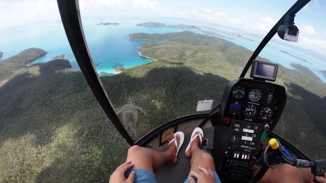 POV, helicopter flies over island in Australia