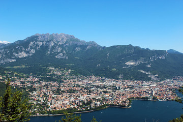 Fototapeta na wymiar City of Lecco (Italy) seen from above and mount Resegone in the background