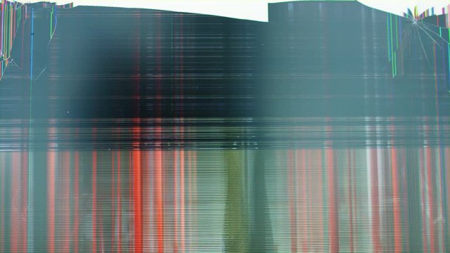 A Silhouette of Man Dancing on a Distorted Movie Scene