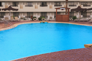 Fototapeta na wymiar swimming pool area in the hotel