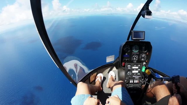 POV, flying over open ocean in helicopter