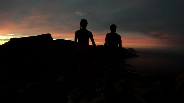 Action camera, hikers silhouetted in Cape Town