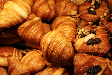Close up of several freshly baked butter and chocolate croissants