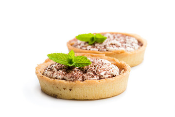 Mini  banoffee pie tarts isolated on white