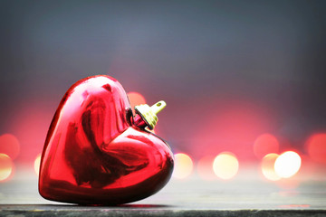  Christmas heart ornament on blurred background with copy space