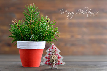 Christmas card with Christmas tree in the pot